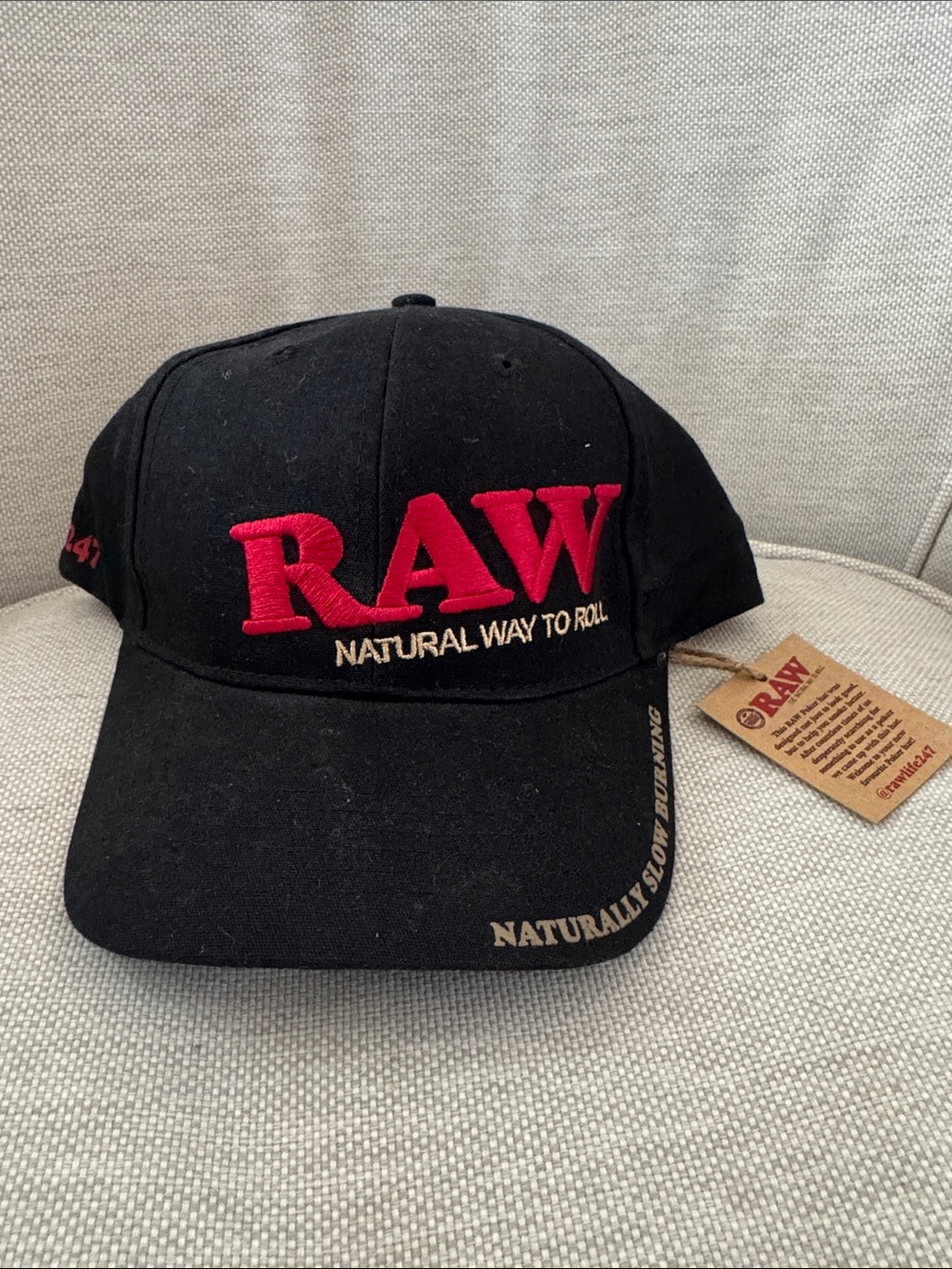 RAW Black Cap with Red Embroidered Logo. New with tags